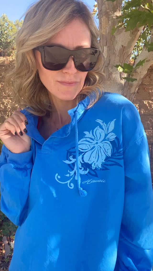 Instagram post by @mommakez3 for Crazy Shirts. Caption reads: This Blue Hawaiian pullover from @crazyshirts is....