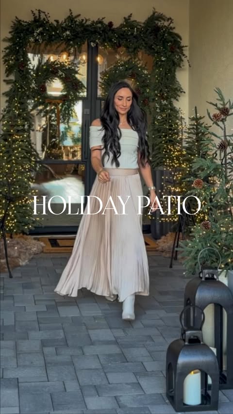 Instagram post by @homewithchrissym for Pottery Barn. Caption reads: Our front patio has never looked more magical for....