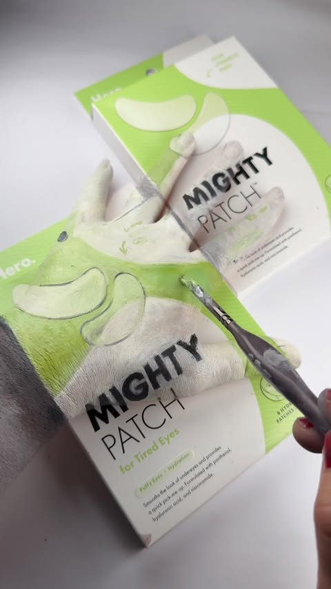 Instagram post by @millybampainti for Hero Cosmetics. Caption reads: Watch my hand disappear into Hero’s Mighty Patch....