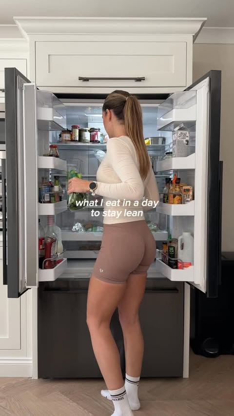 Instagram post by @ellena_fit for Women's Best. Caption reads: [...] pot oat milk latte gym drink @womensbest....