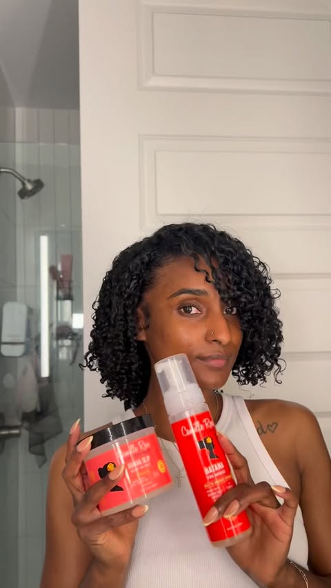 Instagram post by @areiihairjourney for Camille Rose. Caption reads: [...] defined, shiny and hydrated 😍 Shop Camille....