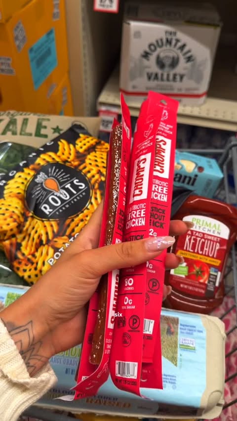 Instagram post by @wellnesswithnini for Chomps. Caption reads: [...] grocery shopping with me💜 @sprouts @chomps....