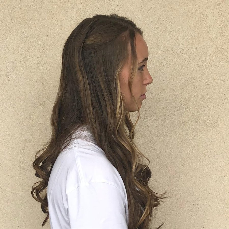 Instagram post by @halbloss for American Salon. Caption reads: A little face framing highlights to brighten up....