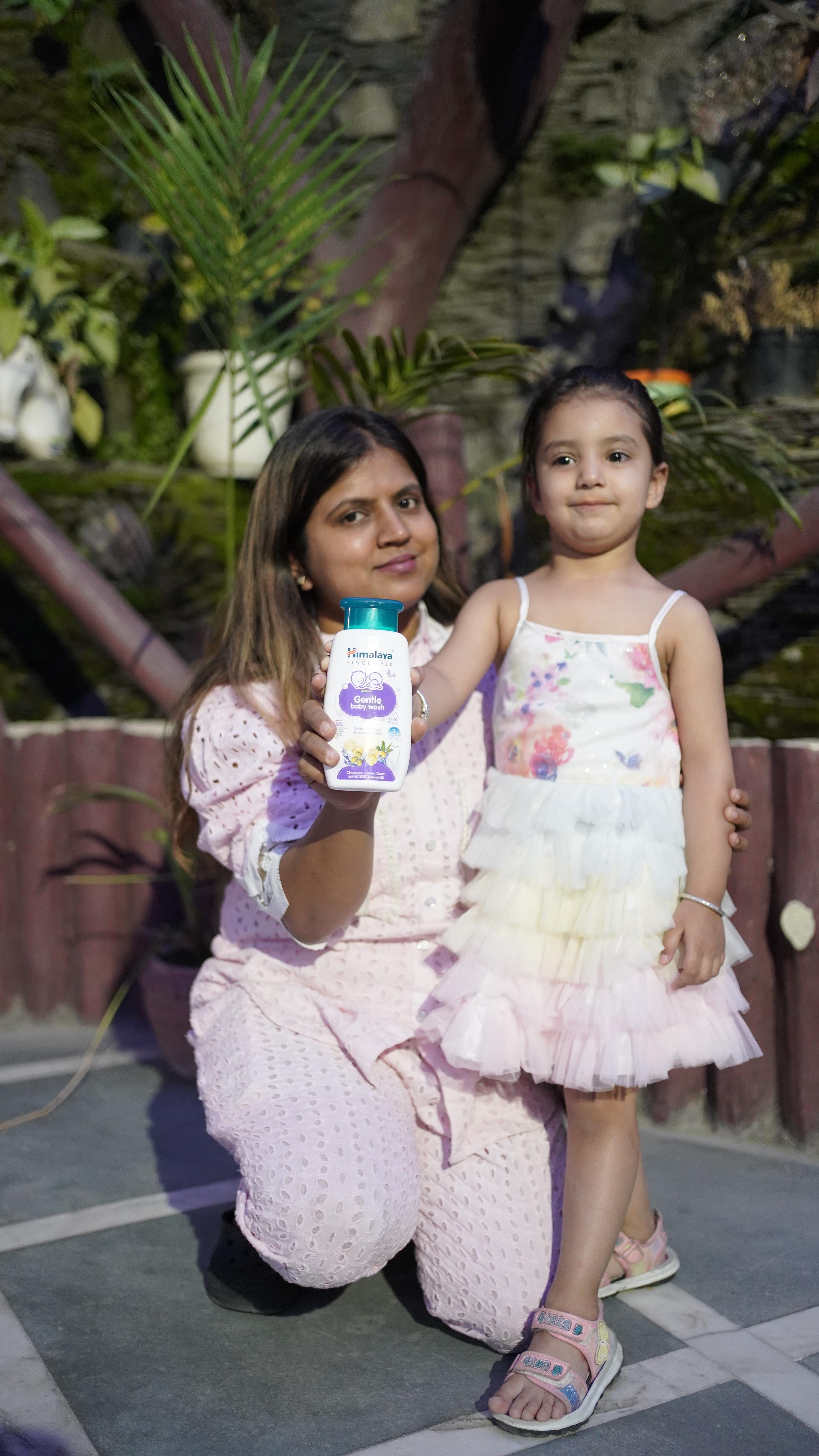 Instagram post by @cute.naisha for Himalaya Babycare. Caption reads: Experience the gentle touch of nature with....