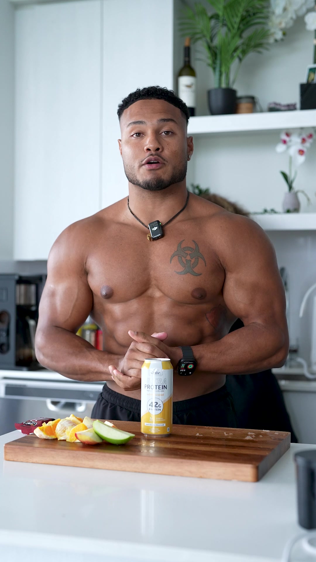 TikTok post by @coach.bluee for Slate Milk. Caption reads: How to hit your protein goal for the day to build....