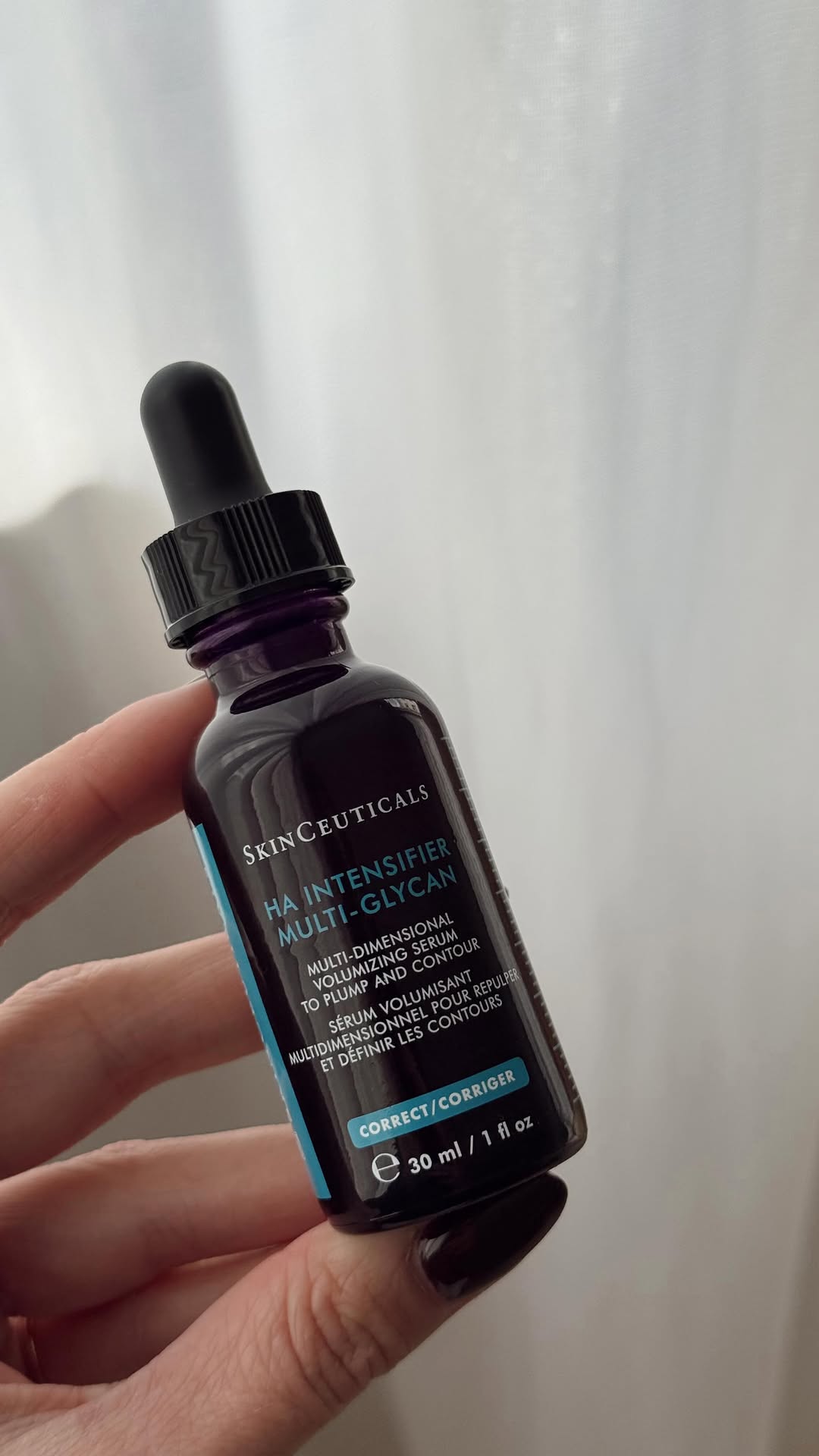 Instagram post by @maifigueiro for SkinCeuticals. Caption reads: O novo aliado do meu skincare 🪄

O HA Intensifier....