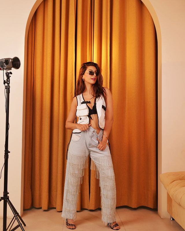 Instagram post by @nikimehra for Urbanic. Caption reads: [...] 🤭

All things street chic with....