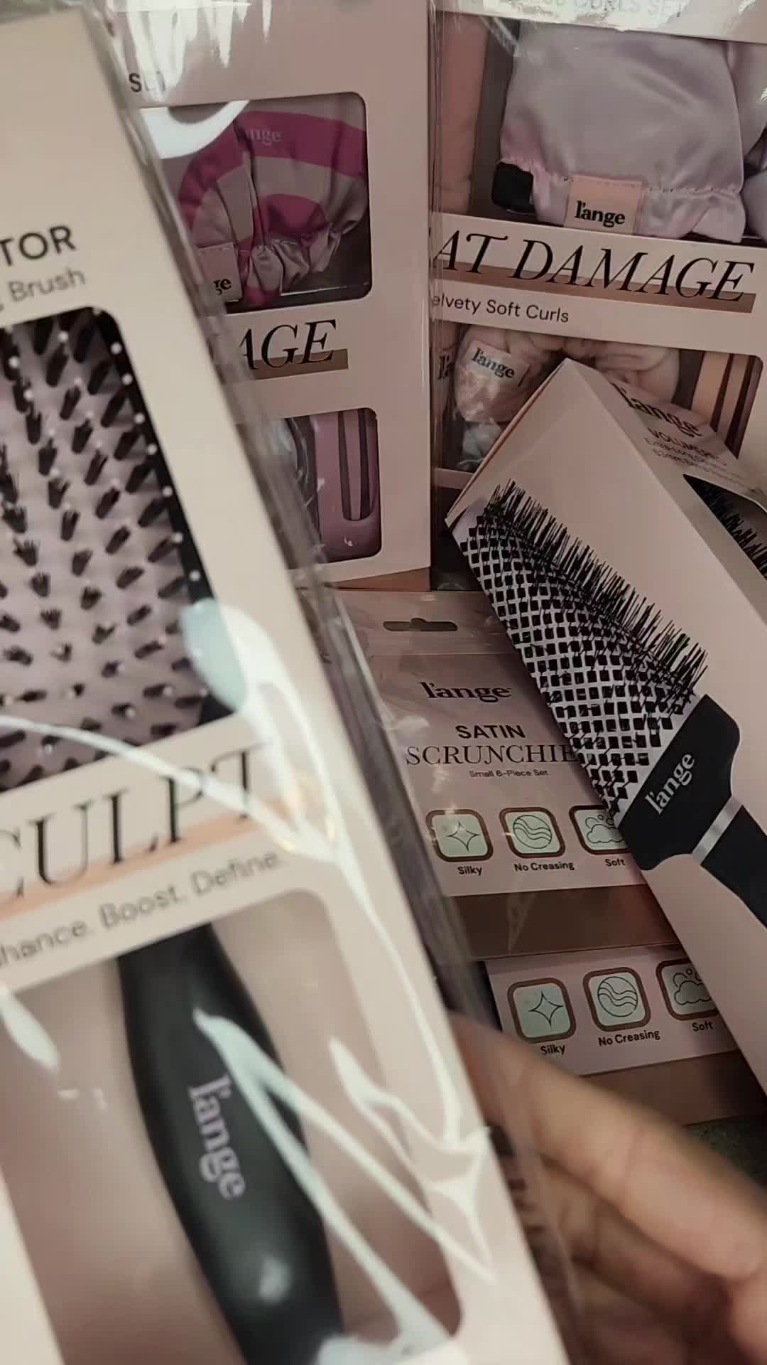TikTok post by @tired.as.a.mother.4 for L’ange Hair. Caption reads: [...] 10% off with code LANGVIP17 @langehair....