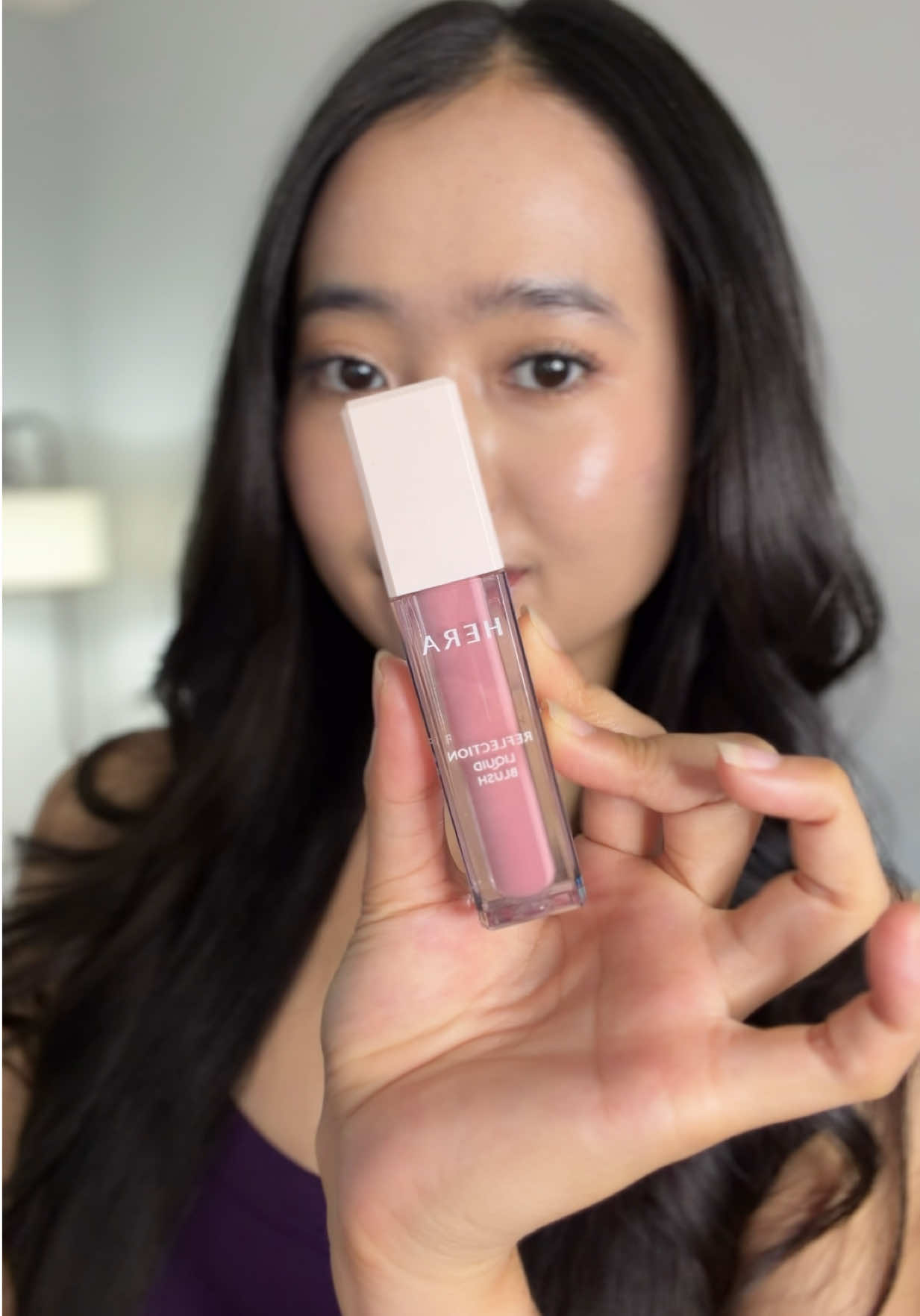 TikTok post by @glowwithsophiaa for HERA KR. Caption reads: [...] for that fresh, dewy cheek look. @HERA @HERA....