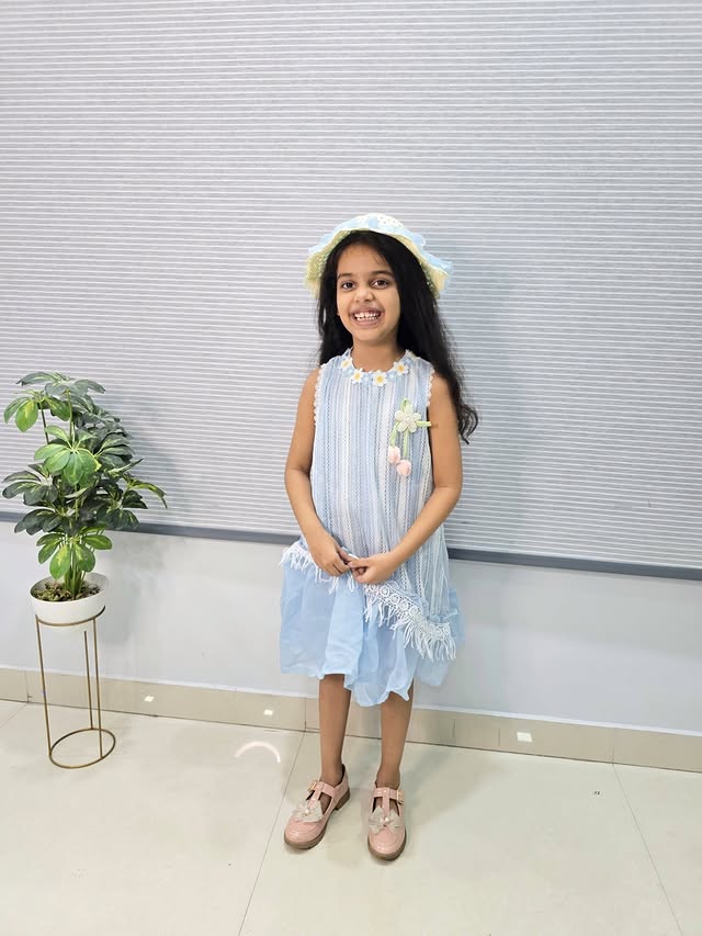 Instagram post by @momdiariesbyritu for Hopscotch. Caption reads: @hopscotch.in just made my vacay wardrobe a 10/10....