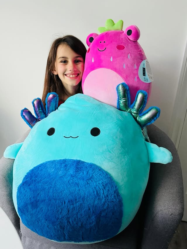 Instagram post by @mamadoitblog for Squishmallows. Caption reads: [...] she has just been sent two NEW Squishmallows....