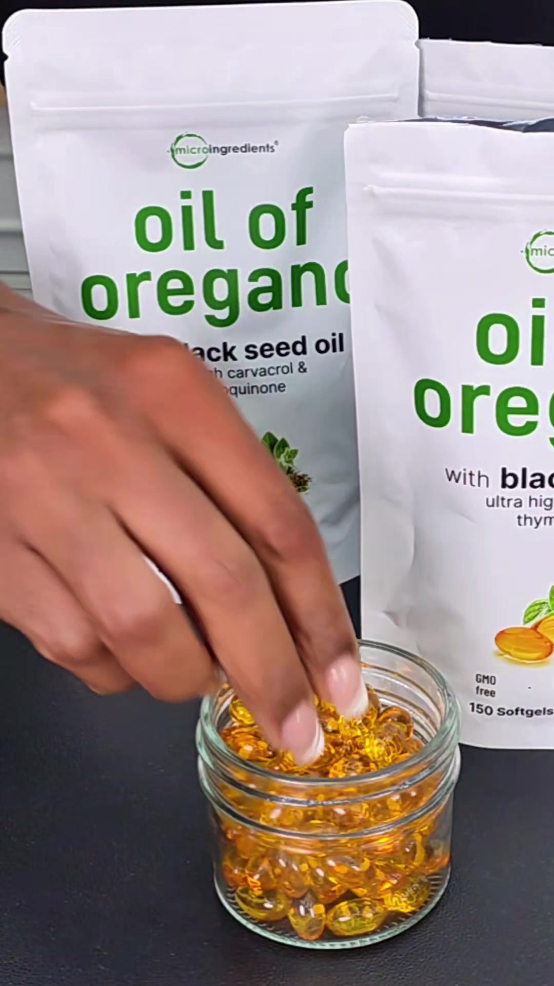 TikTok post by @kevework for Micro Ingredients. Caption reads: [...] Oregano with Black Seed Oil from Micro....