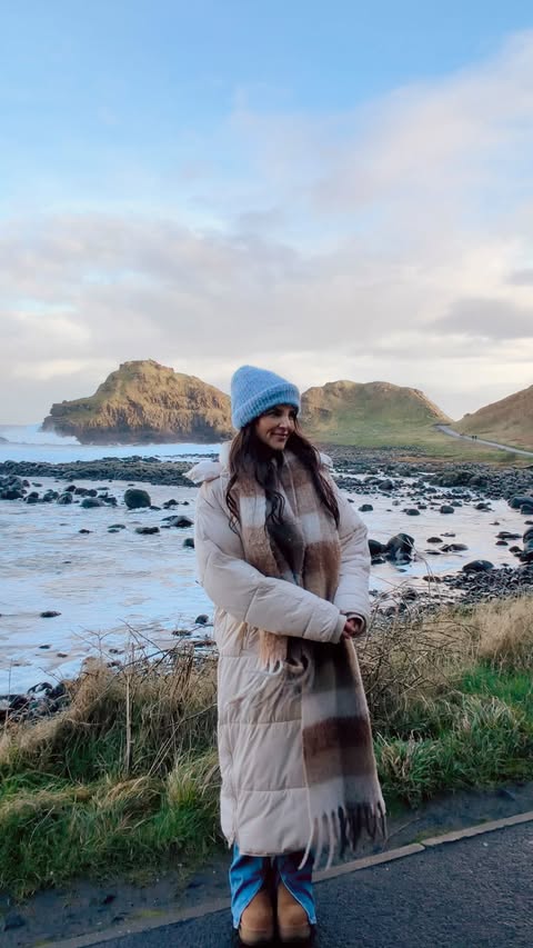 Instagram post by @postcardsbyhannah for Tourism Ireland. Caption reads: ad Northern Ireland this winter? One of the most....