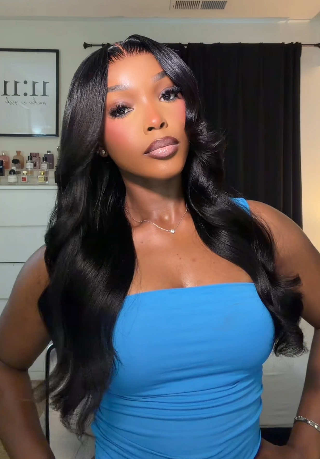 TikTok post by an influencer for Westkiss Hair. Caption reads: [...] body wave wig 🔗ed in cart....