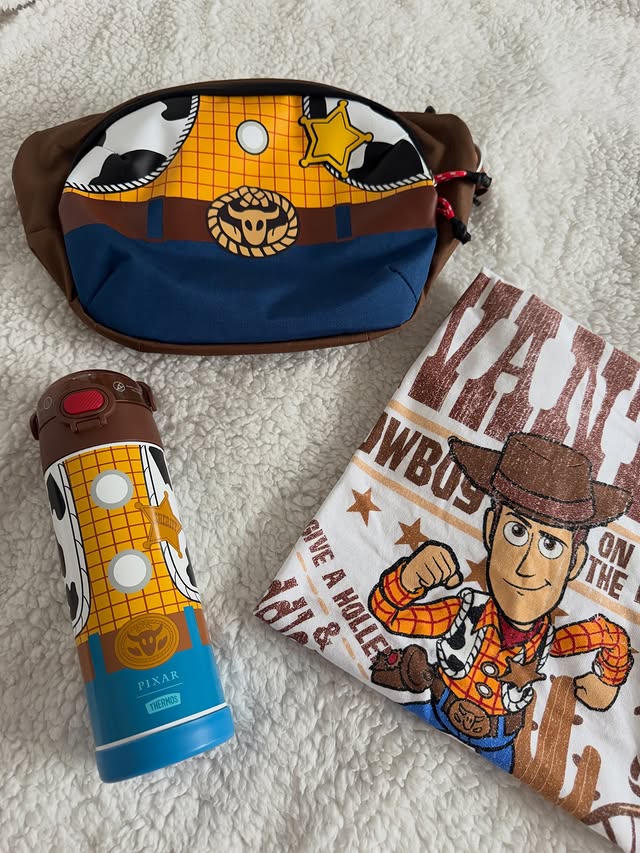Instagram post by @pixiedustoxox for Orbitkey. Caption reads: [...] cutest Pixar Toy Story sling bag from....