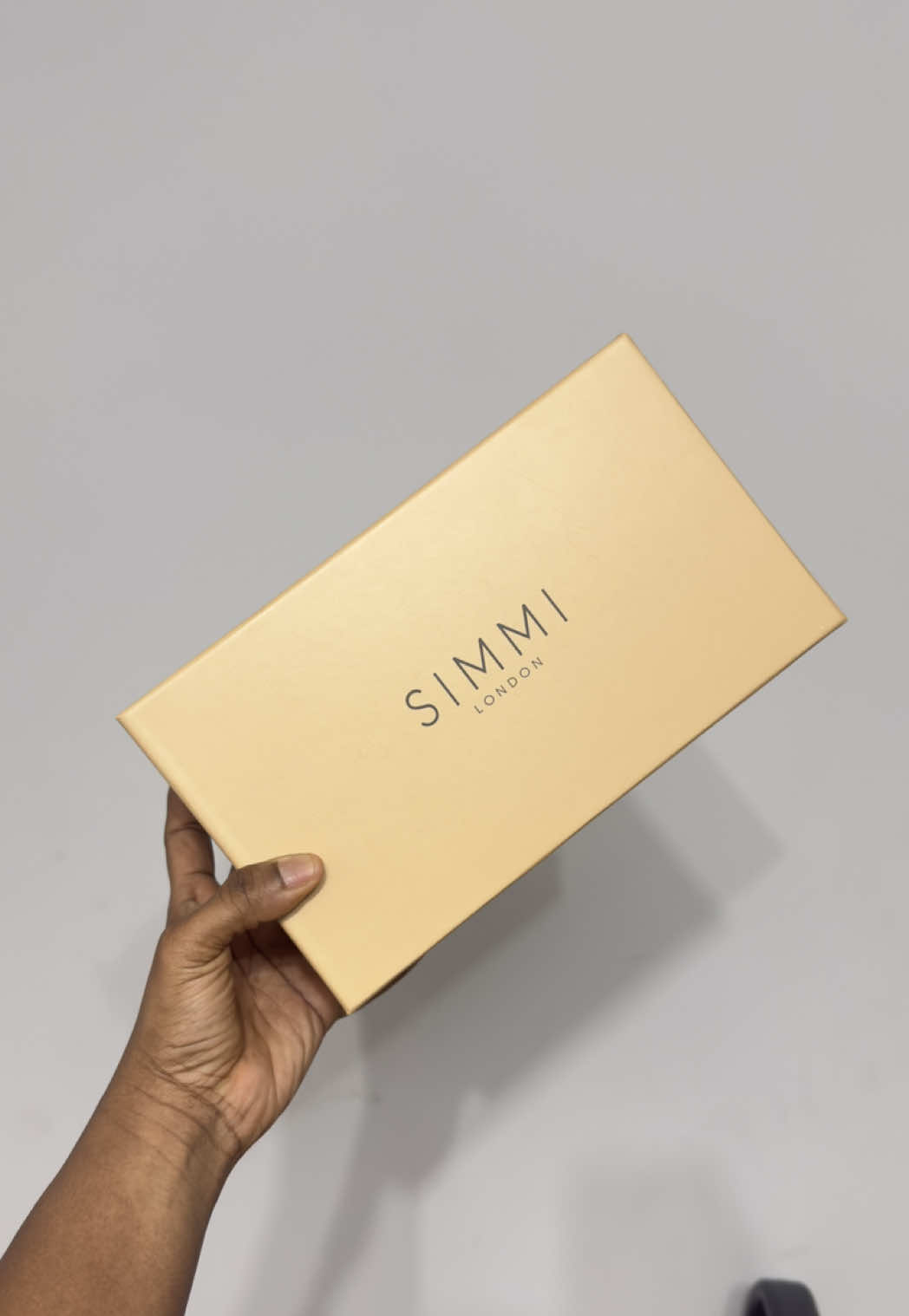 TikTok post by @elizabeth_membere for Simmi London. Caption reads: New year silver heels !  Get this from....