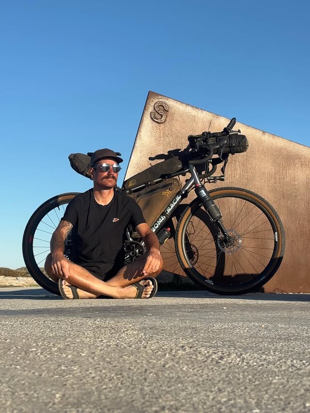 Instagram post by @adrien__liechti for IZIPIZI. Caption reads: I finished my world record ride a week ago, alone,....
