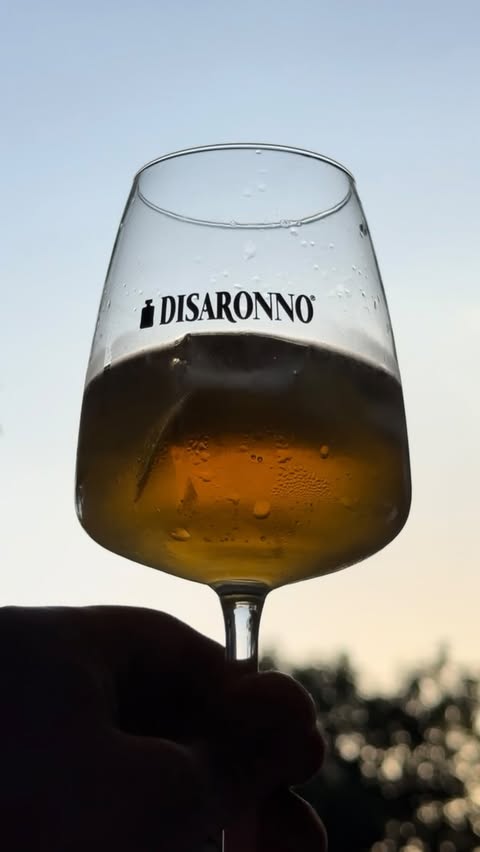 Instagram post by @james__holdsworth for Disaronno. Caption reads: [...] and enjoy a stunning glass of....