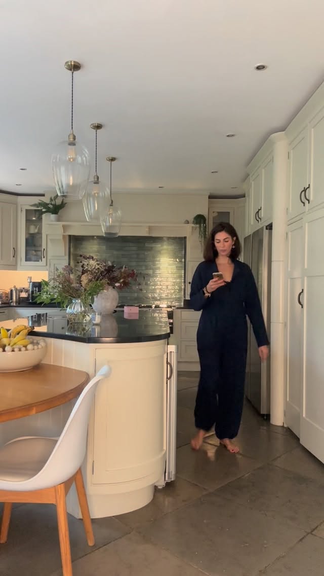 Instagram post by @annamathur for Free People. Caption reads: Do you ever find yourself standing in the kitchen,....