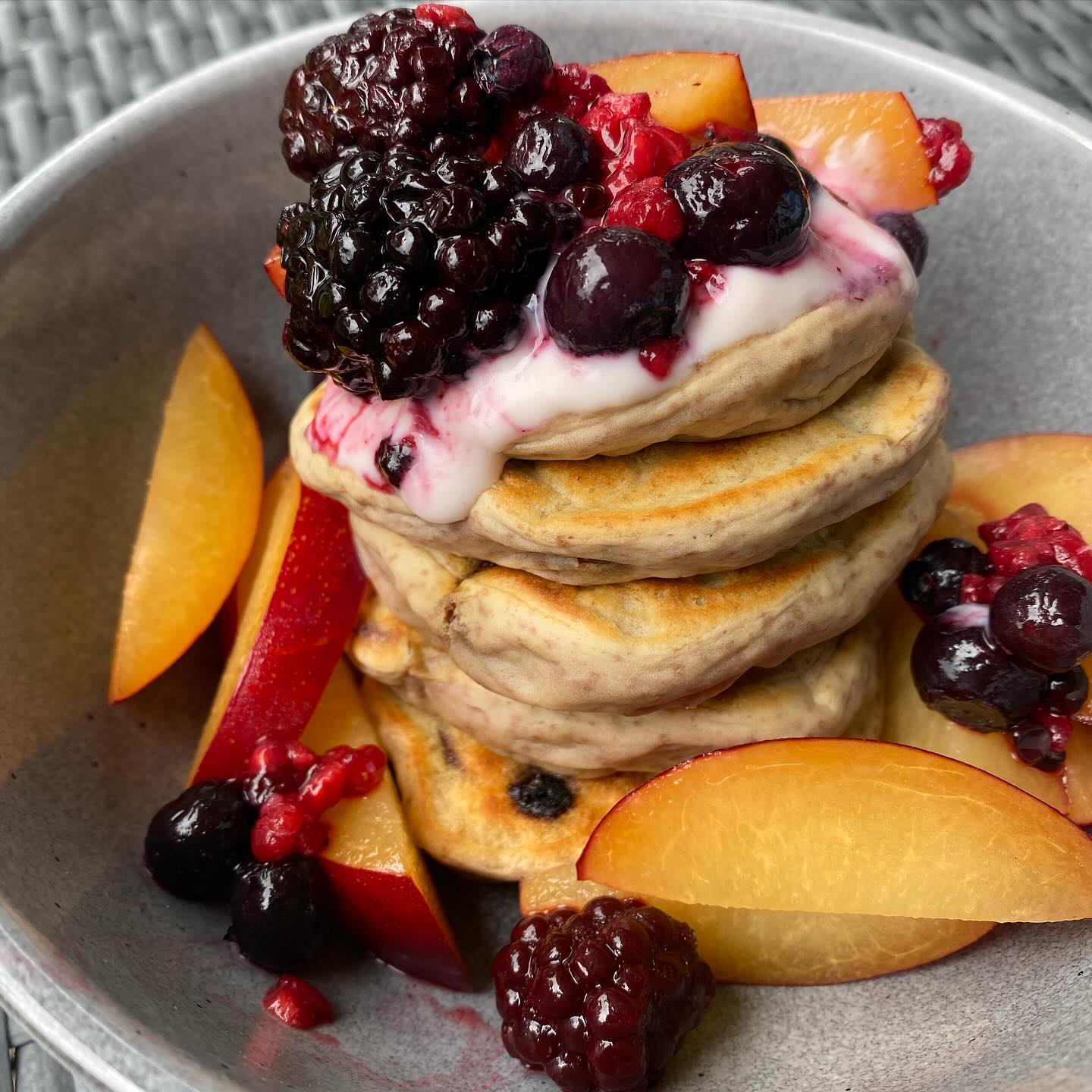 Instagram post by @thatsimpleblog for Protein World. Caption reads: VANILLA CHOC CHIP PROTEIN PANCAKES 🥞....