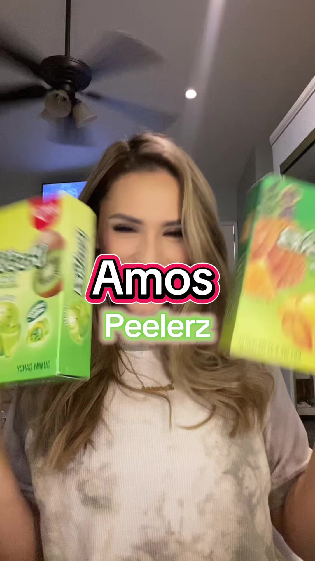 TikTok post by @kayycm for Amos Sweets. Caption reads: @Amos Sweets never misses!!! Candy made [...].