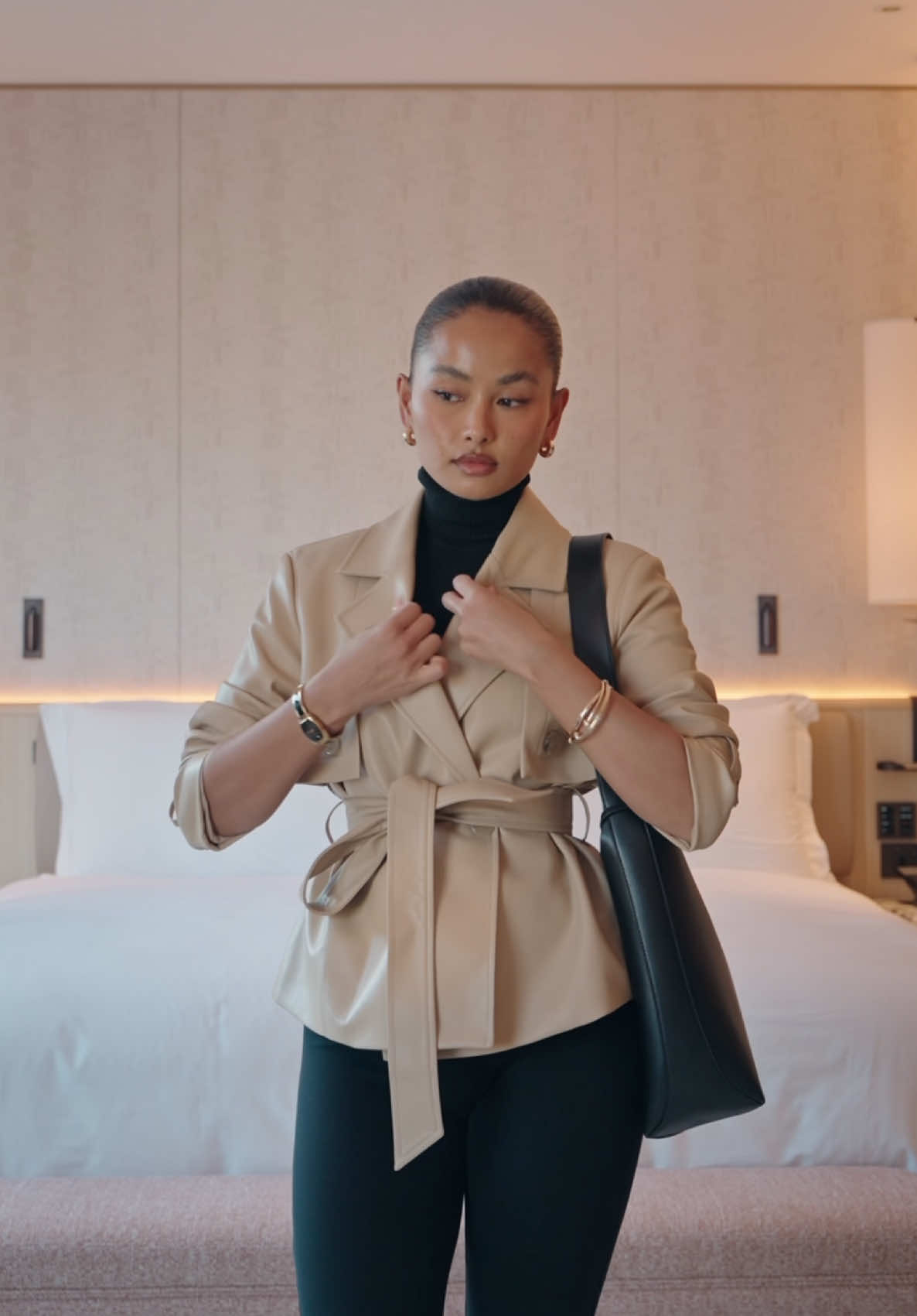 TikTok post by @aanishagurung_ for Anne Klein. Caption reads: Spring layers done right @Anne Klein @Macy’s AD.....