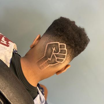 Instagram post by @bubba_cutz for Barbershopconnect. Caption reads: HAPPY JUNETEENTH ✊🏼✊🏽✊🏾✊🏿#juneteenth....