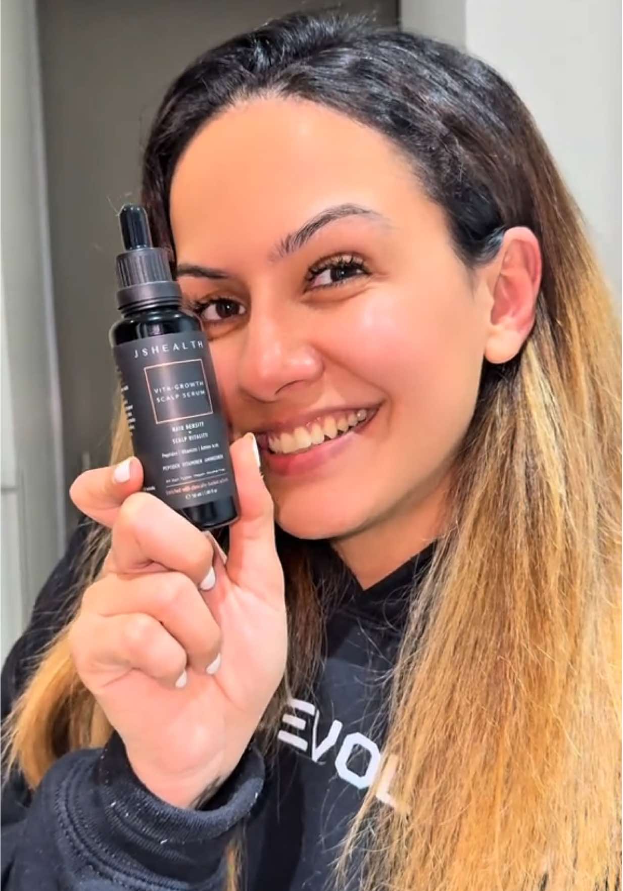 TikTok post by @seemafvlkrum for JSHealth Vitamins. Caption reads: Consistency over perfection. Giving my strands the....