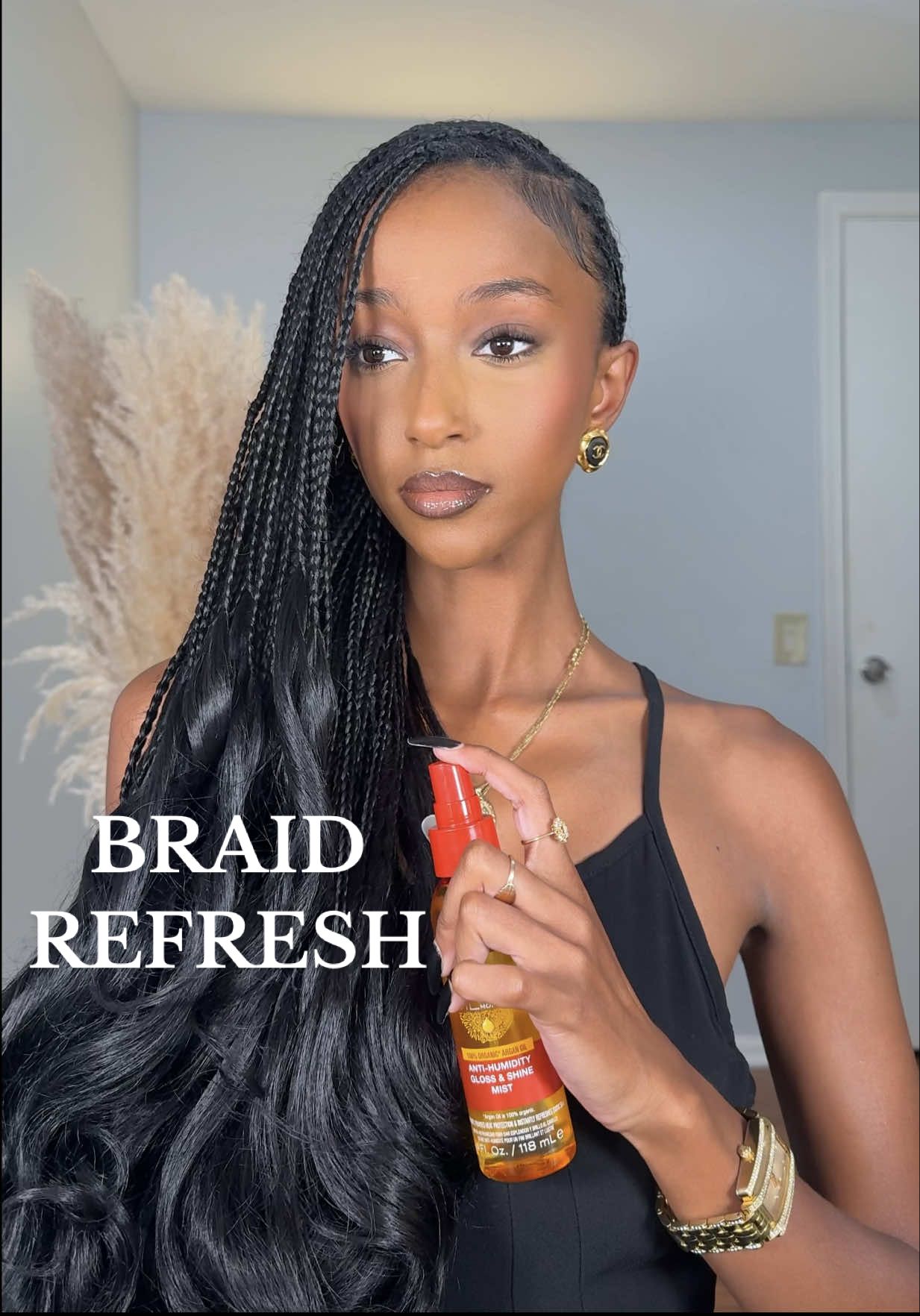 TikTok post by @bethermias for Creme of Nature. Caption reads: [...] the curls are looking brand new😍 @Creme of....