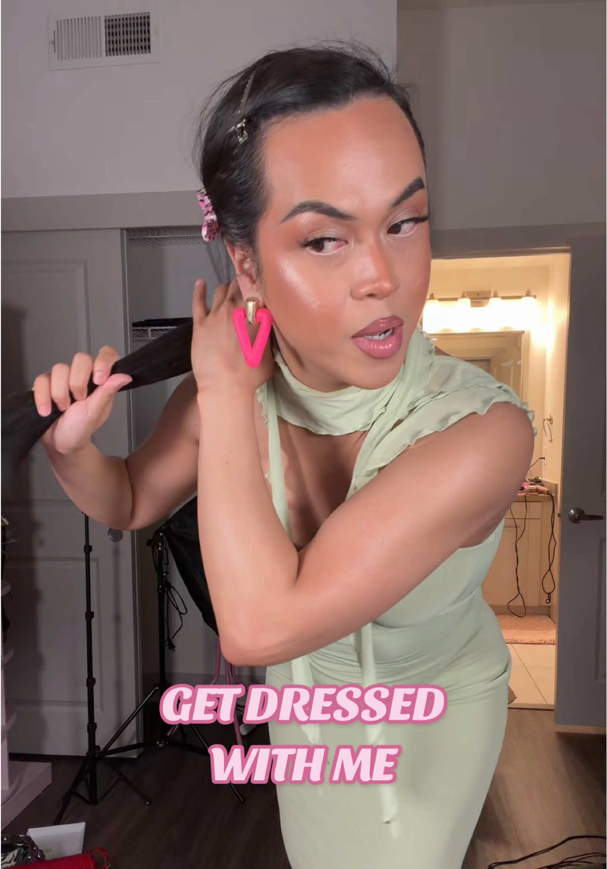 TikTok post by @miarenaa_ for PALMERS. Caption reads: thank you for having me @Pixi Beauty 💚🧚🌸 #OOTD....