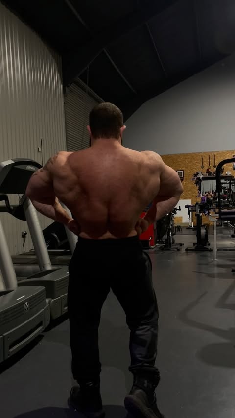 Instagram post by @dean_the_great_white_ifbbpro for Hosstile. Caption reads: [...] to busy trying to get massive 😅💪....