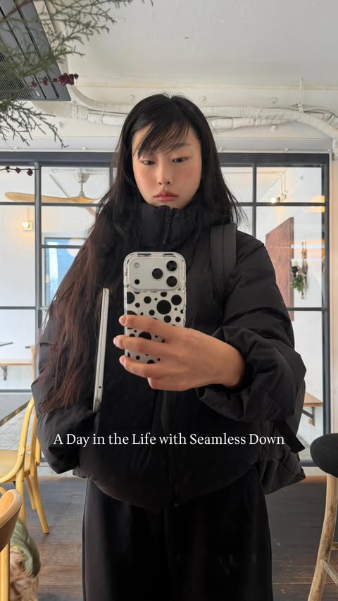 Instagram post by @sooooorok for UNIQLO. Caption reads: A day in the Life with Seamless Down @uniqlokr....