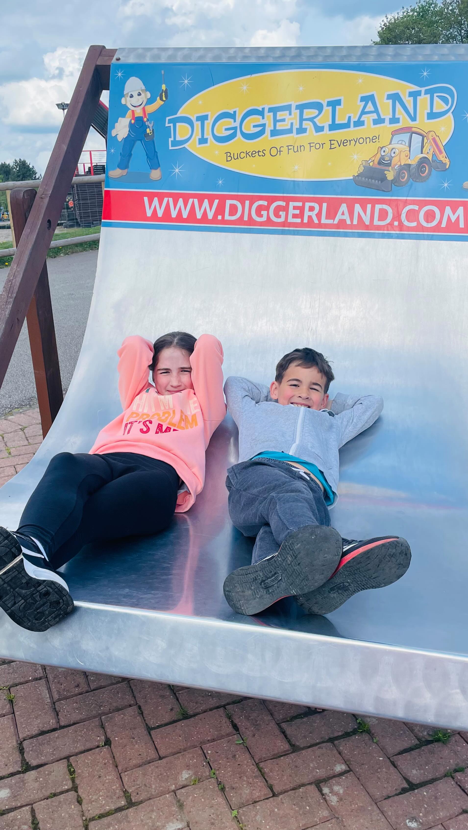 Instagram post by @ourtripswithtwo for Diggerland. Caption reads: Diggerland is the ultimate day out for any digger....