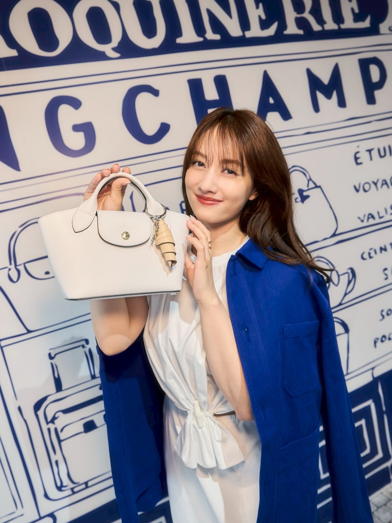 Instagram post by @mariaaaa728 for Longchamp. Caption reads: 代官山T-SITE GARDEN....