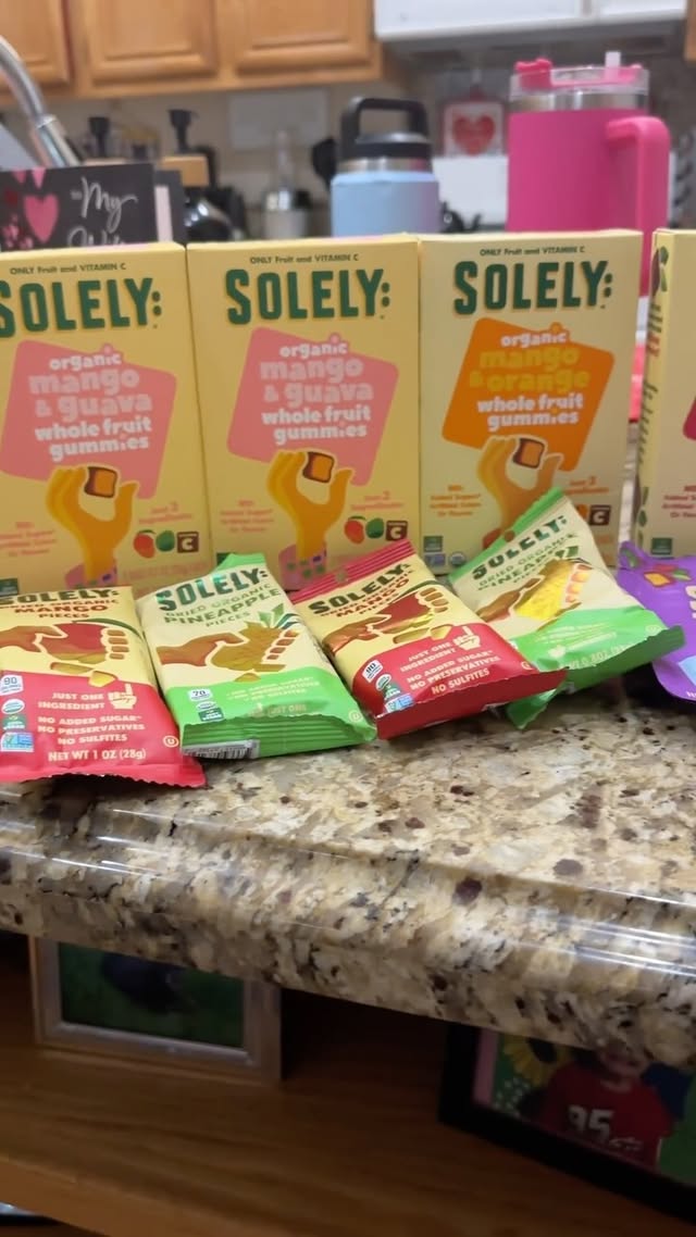 Instagram post by @makeupbyeljaik for Solely. Caption reads: You can take these @solelyfruit snacks everywhere,....