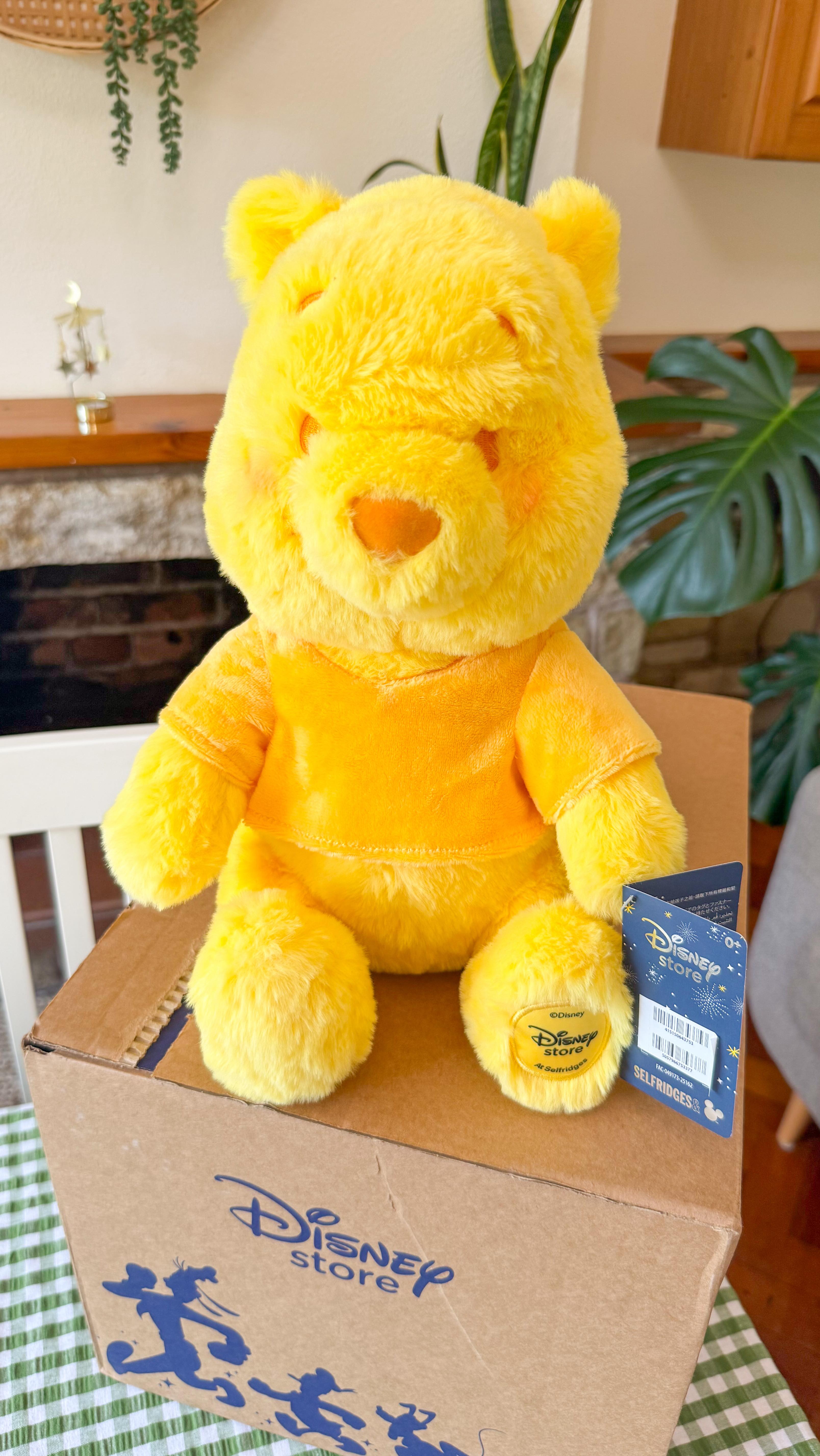 Instagram post by an influencer for Disney UK. Caption reads: Let’s unbox the NEW Disney x Selfridges Winnie the....