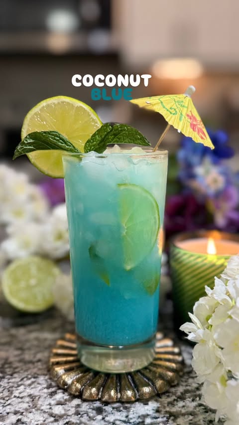 Instagram post by @sipsbyeric for Harmless Harvest. Caption reads: [...] enjoy your tropical blue escape 🌊✨....