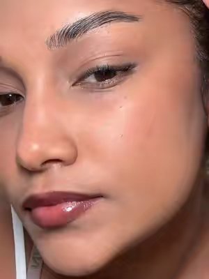 TikTok post by @todaywithtonya_ for KraveBeauty. Caption reads: [...] Mineral powder: @PUR Lip gloss: @KraveBeauty.