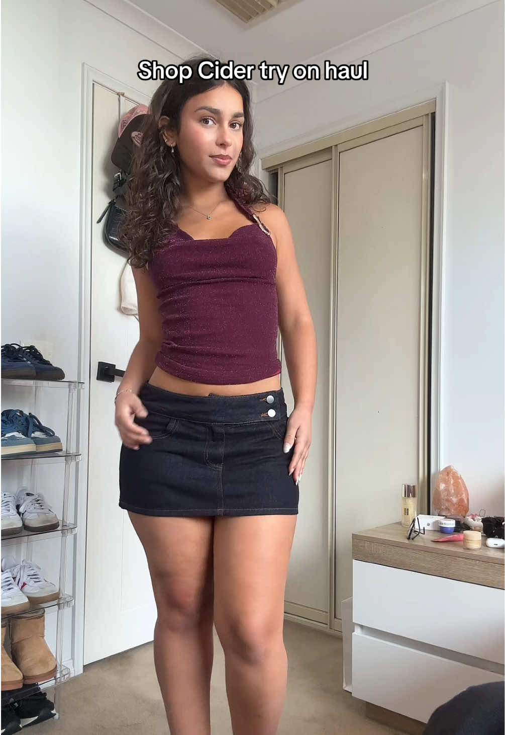 TikTok post by @nataliesmirnakos for Cider. Caption reads: Dc”NATALIESMIRNAKOS15 @Cider #shopcider #tryonhaul....