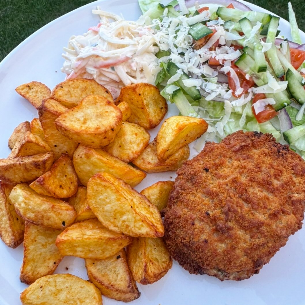 Instagram post by @tmac_nua22 for Jd Seasonings. Caption reads: Chicken Kiev, chips and salad 🥗 for dinner....