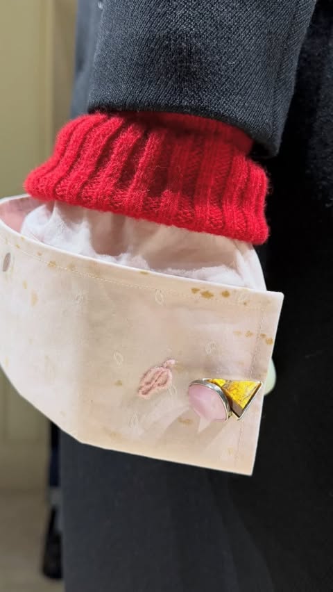 Instagram post by @poominwonderland for Prada. Caption reads: [...] is clean why are the cuffs dirty?
#pradafw26.