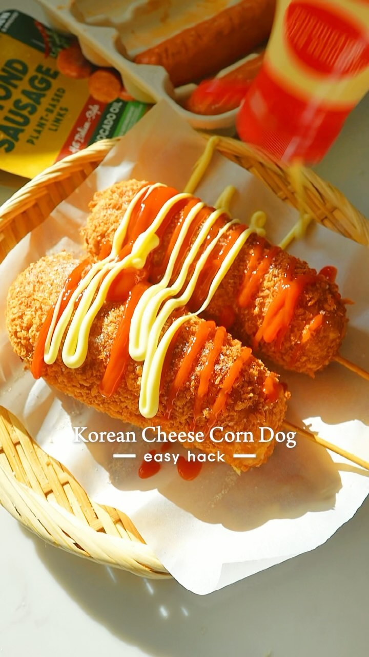 Instagram post by @fationatefoodbelly for Beyond Meat. Caption reads: Cheesy corn dogs all summer long 🌭 

Comment....