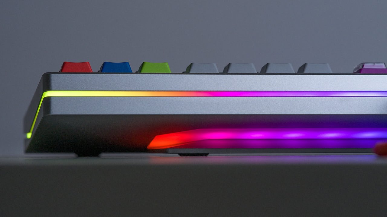 YouTube post by @alexotos for Unikeyboards. Caption reads: The Paper80, Is This Wuque's Best Release Yet?.