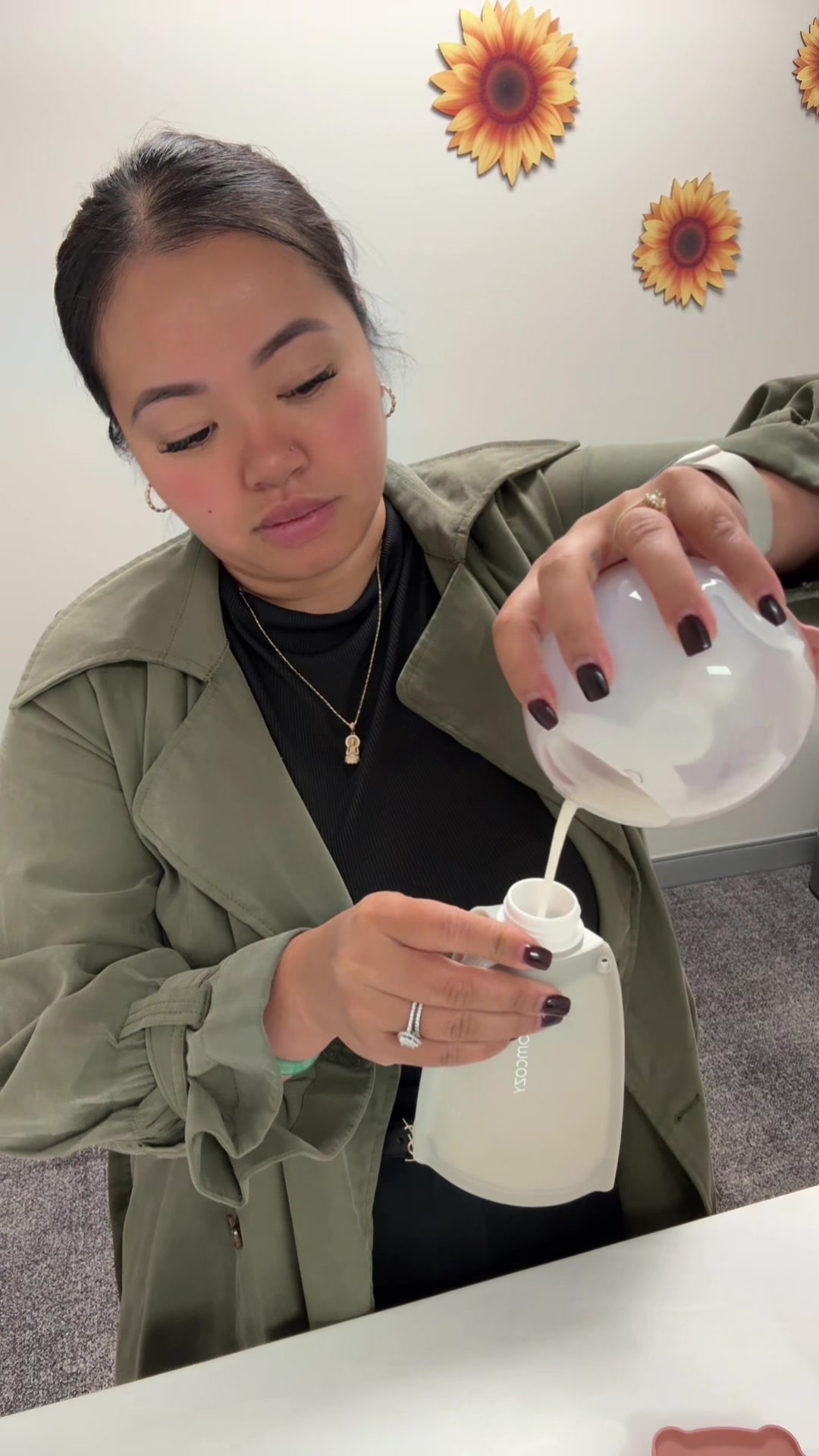 TikTok post by @xoxomonnie for Momcozy. Caption reads: Working mom pump + pour @Momcozy Official discount....