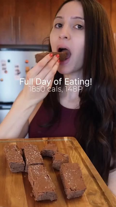 Instagram post by @fitfood_ae for PEScience. Caption reads: [...] to eat 🍕🍰🥣 Protein powder used is....