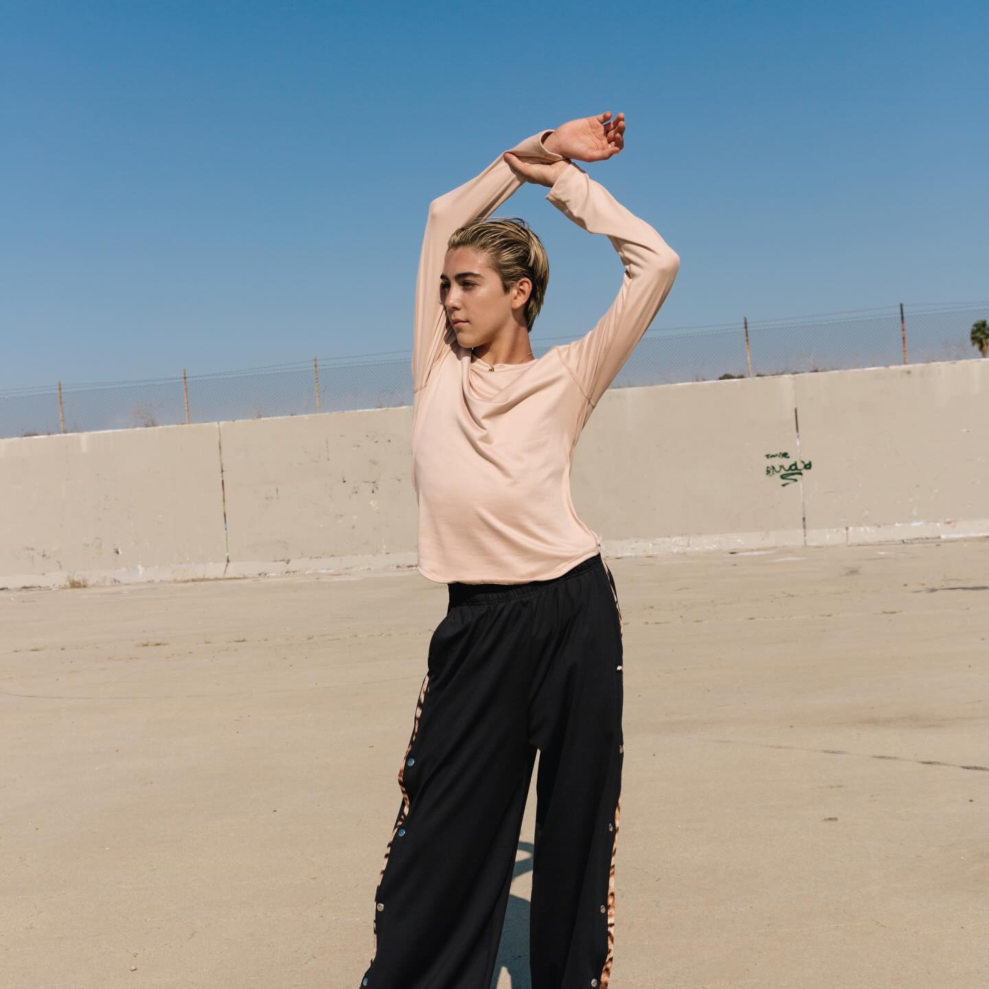 Instagram post by @tristan_jones_dancer for Tiger Friday. Caption reads: [...] 𝙨𝙩𝙧𝙚𝙚𝙩𝙬𝙚𝙖𝙧 𝙗𝙮 @tigerfriday....