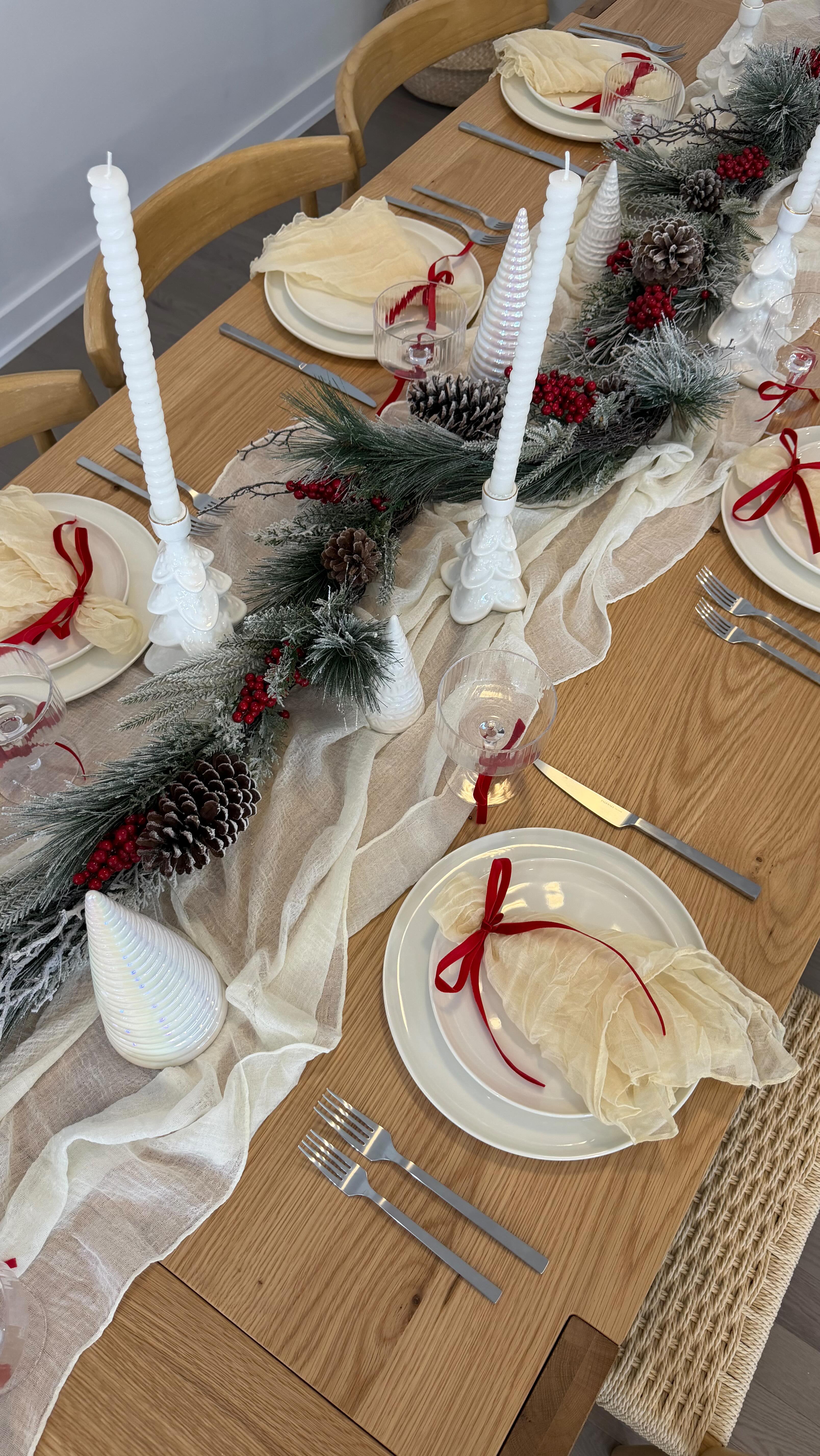 Instagram post by @caitliniola for Castlery. Caption reads: Setting up to host a Holiday dinner party 🎄....