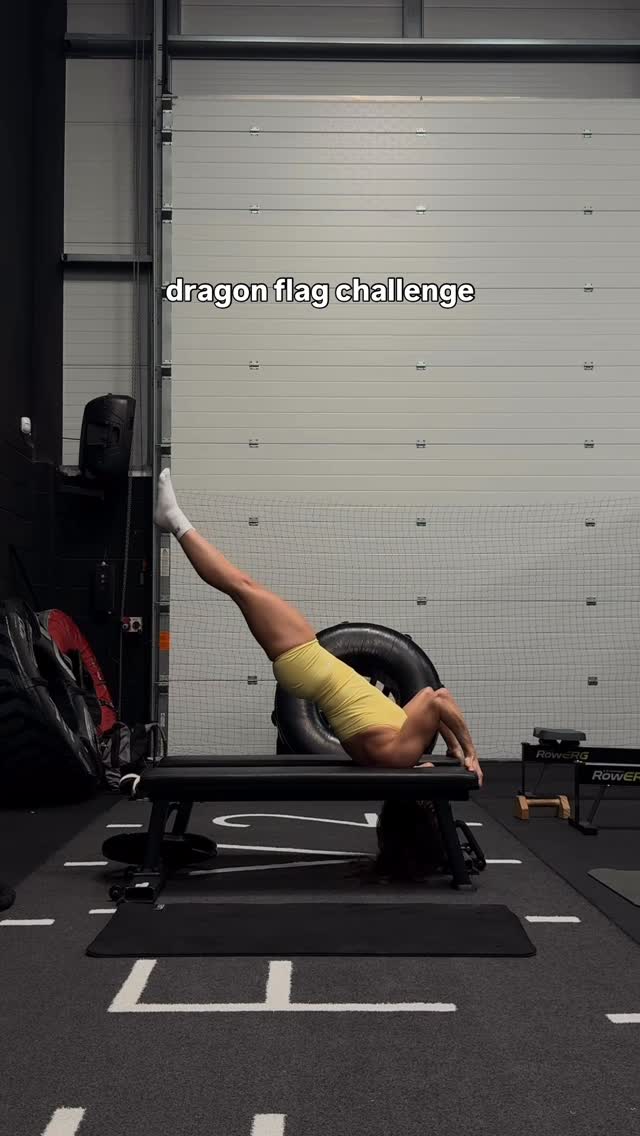 Instagram post by @dailyjlh for AYBL. Caption reads: Dragon flag challenge 🐉 @aybl dc NEENY (wearing....