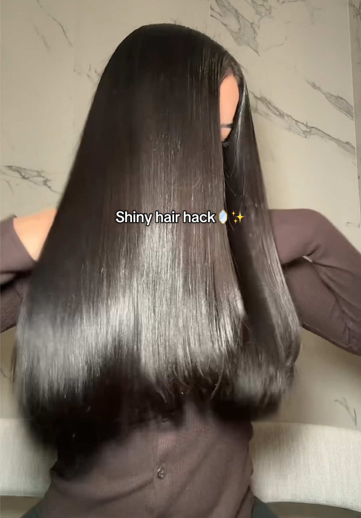 TikTok post by @gabrielaabm_ for Color Wow Hair. Caption reads: finishing shine spray for that glass hair look 🪞✨....