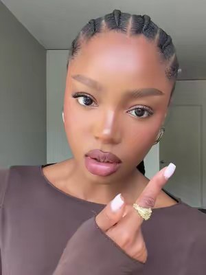 TikTok post by @florenceoginni for imPRESS Beauty. Caption reads: The most effortless way to spice up your eye looks....